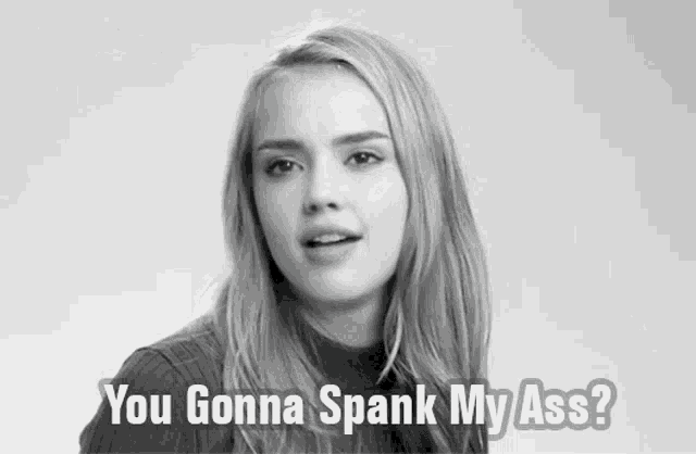 a black and white photo of a woman with the words " you gonna spank my ass "