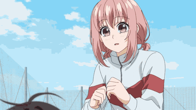 a girl with short black hair is smiling and wearing a white and red striped sweater