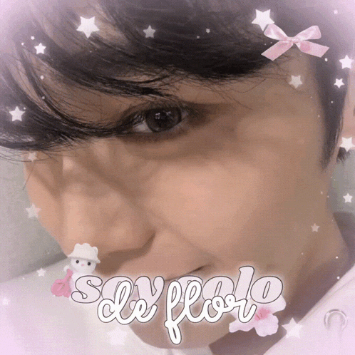 a close up of a person 's face with the words say hello on the bottom right