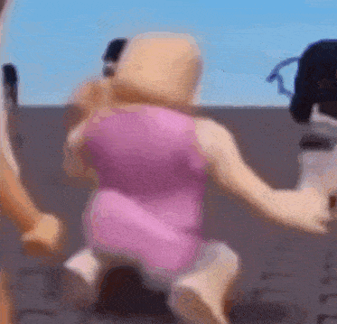 a blurred image of a person in a pink dress holding hands with a dog .