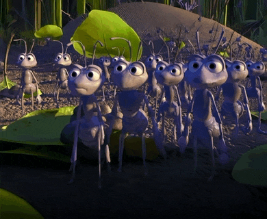 a group of cartoon ants are standing around a leaf