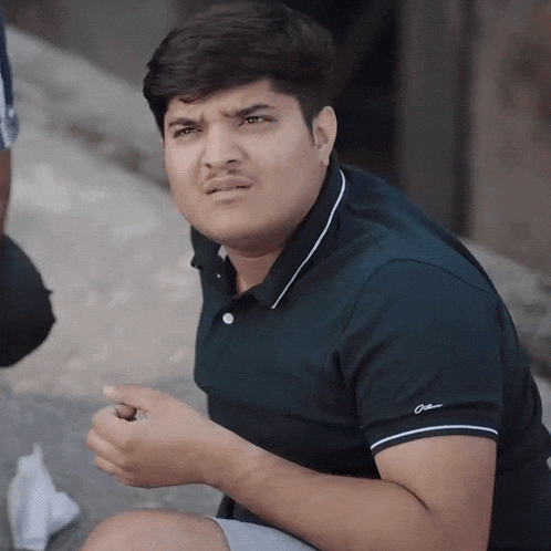 a man wearing a black polo shirt that says o'neill on the sleeve