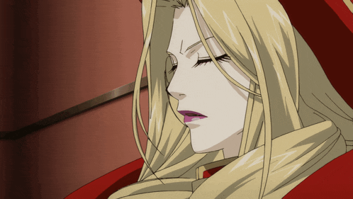 a woman with long blonde hair and a red scarf around her neck