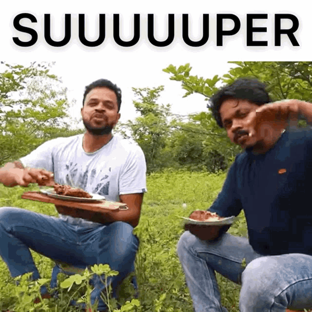 two men are squatting in the grass with plates of food in front of a sign that says suuuuper