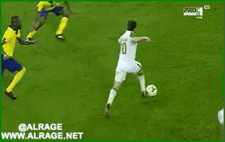a soccer player with the number 10 on his jersey is kicking the ball