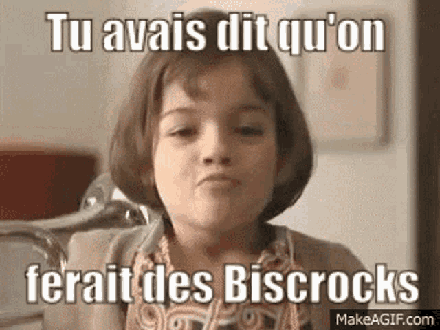 a little girl is making a funny face with the words `` tu avais dit qu'on ferait des biscrocks ''