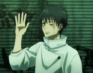 a young man in a white jacket is waving his hand in the air .