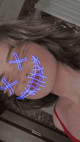 a close up of a woman 's face with long hair