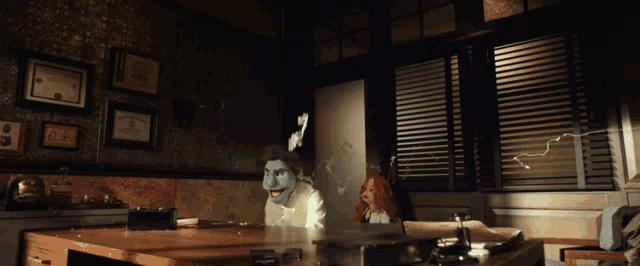 a ghostly face is projected on a wall in a room