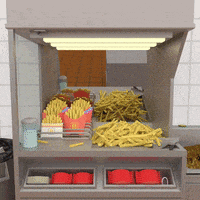 a display of french fries with a sign that says mcdonalds on it