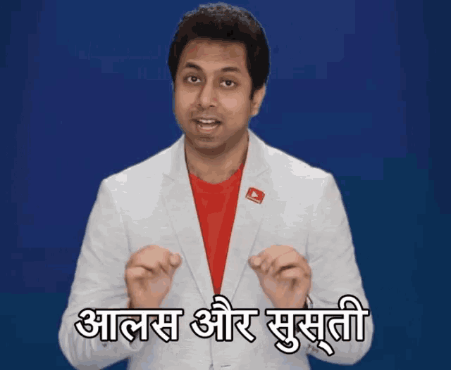 a man wearing a white jacket and a red shirt with a youtube logo