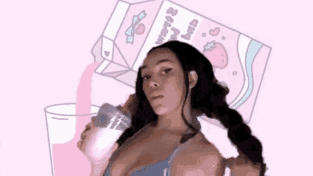 a woman is pouring a milkshake into a glass .