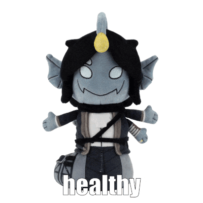 a stuffed toy with the word healthy written on it
