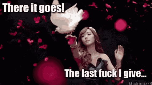 a woman is holding a white dove with the words there it goes and the last fuck i give written on the bottom