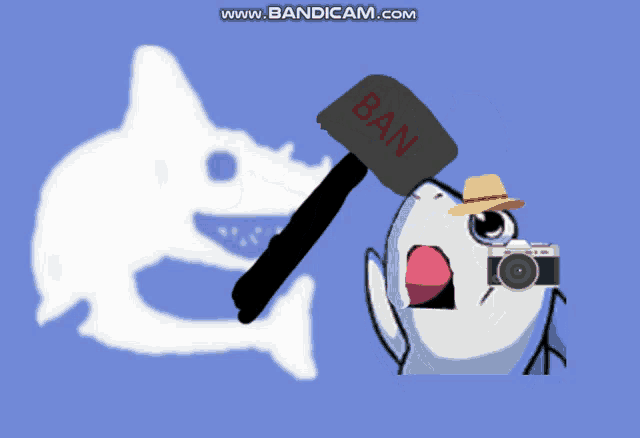 a shark is holding a hammer with the word ban on it