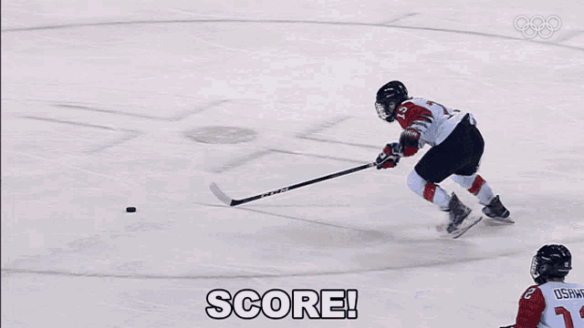 a hockey player with the number 15 on his jersey is on the ice