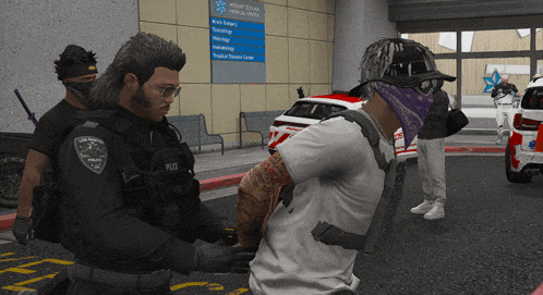 a man in a bandana is being searched by a police officer in front of a mountain medical center sign
