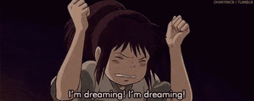 a girl from spirited away is screaming and holding her fists in the air .