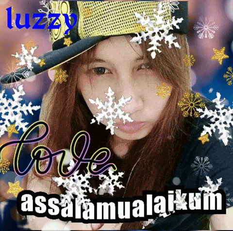 a woman wearing a hat is surrounded by snowflakes and the words love assalamualaikum