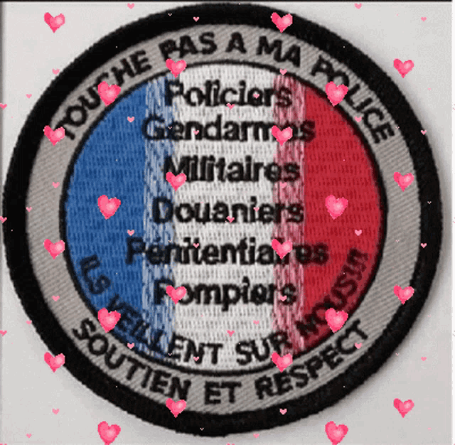 a patch that says touche pas a ma police is surrounded by hearts