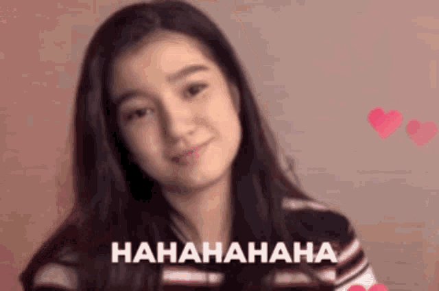 a girl is laughing with the words hahahaha on the bottom right