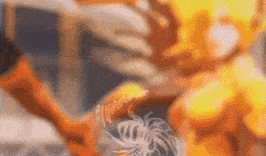 a close up of a person holding a bee in their hand in a blurred image .
