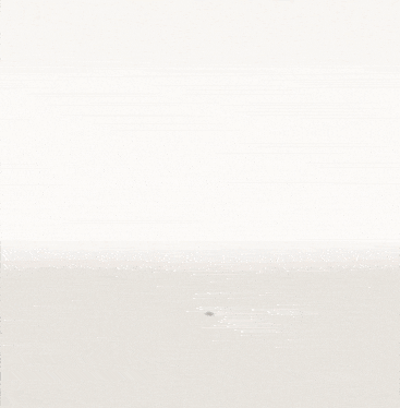 a woman is swimming in the water and her reflection is in the water