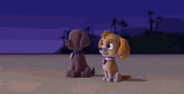 a couple of cartoon dogs sitting next to each other on a beach .