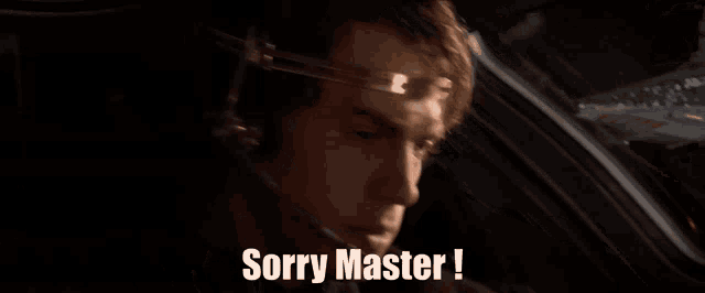 a man in a car with the words sorry master on the bottom