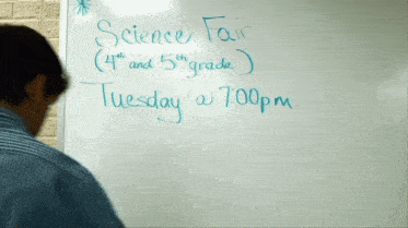 a white board says science fair 4th and 5th grade tuesday at 7:00pm