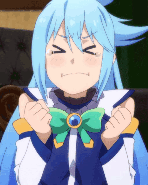 a girl with blue hair and a green bow is making a face with her eyes closed