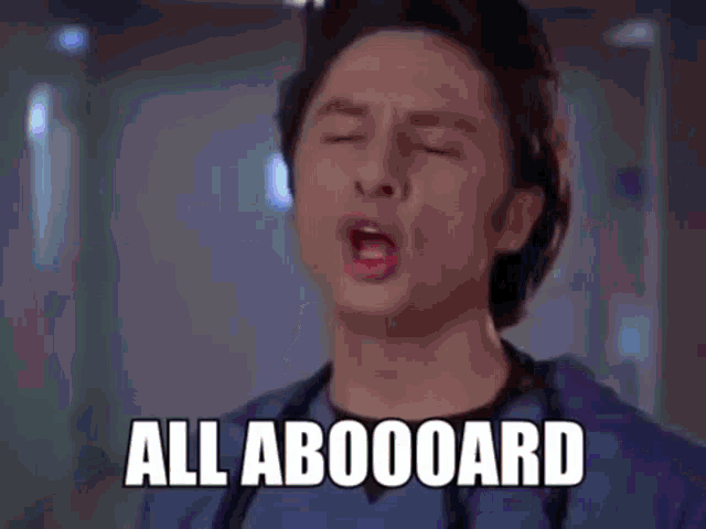 a man with his mouth open and the words all aboard written on his face