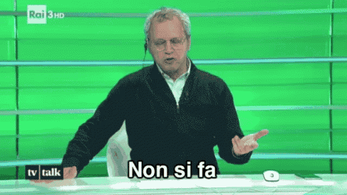 a man in a black sweater says non si fa on a green background