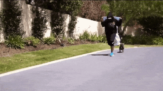 a person is riding a skateboard down a road