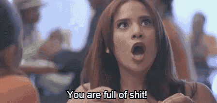 a woman is yelling at someone and saying `` you are full of shit '' .