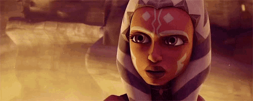 a close up of a cartoon character 's face with a striped hood .