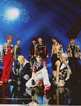 a group of young men are posing for a picture and the word chen is on the bottom right