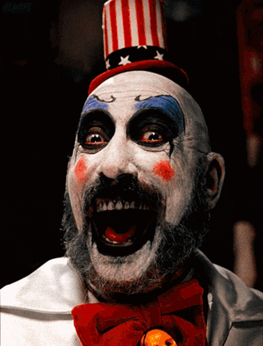 a clown with a red white and blue top hat and a bow tie