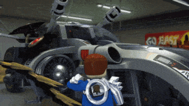 a cartoon character is standing in front of a vehicle with a sign that says go easy