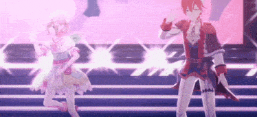 a boy and a girl are dancing on a stage in front of a pink background .