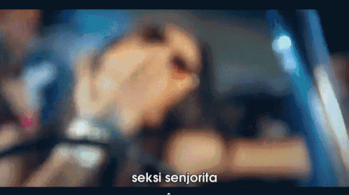 a blurry picture of a woman with the words seksi senjorita written below her