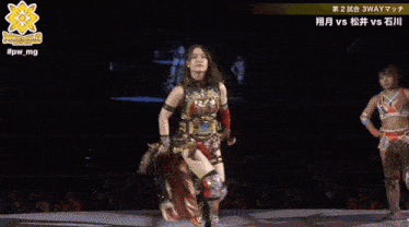 a female wrestler is kneeling down in front of a crowd with the hashtag #pwmg