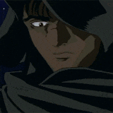 a close up of a man 's face with a hood over his head
