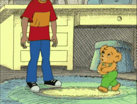 a cartoon of a boy standing next to a teddy bear .