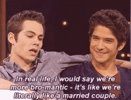 two men are sitting next to each other and one of them says in real life