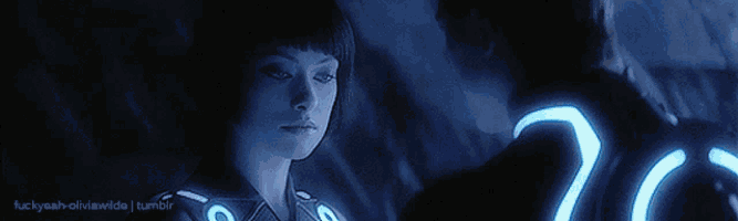 a man and a woman are looking at each other with the words fuckyeah-oliviawilde tumblr at the bottom of the image