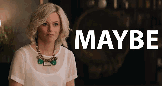 a woman in a white top is sitting in front of a sign that says maybe