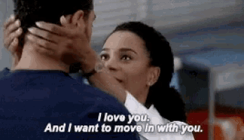 a man and a woman are hugging and the woman is saying i love you and i want to move in with you