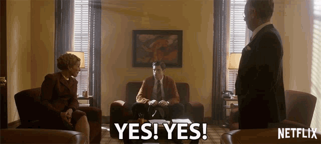 a netflix ad shows a man sitting on a couch and a woman sitting in chairs