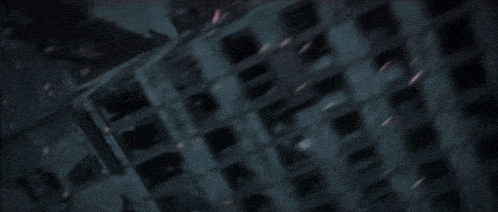 a close up of a person 's face with a blurred background
